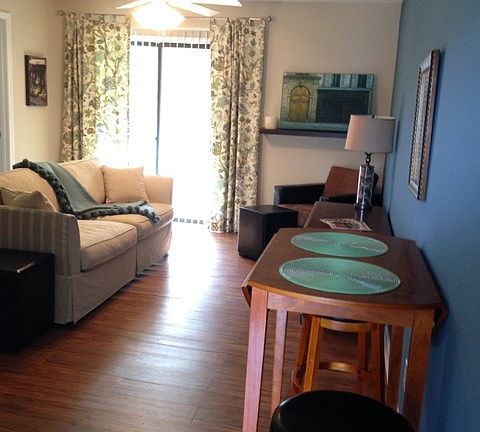 Open living room with provated patio & storage!