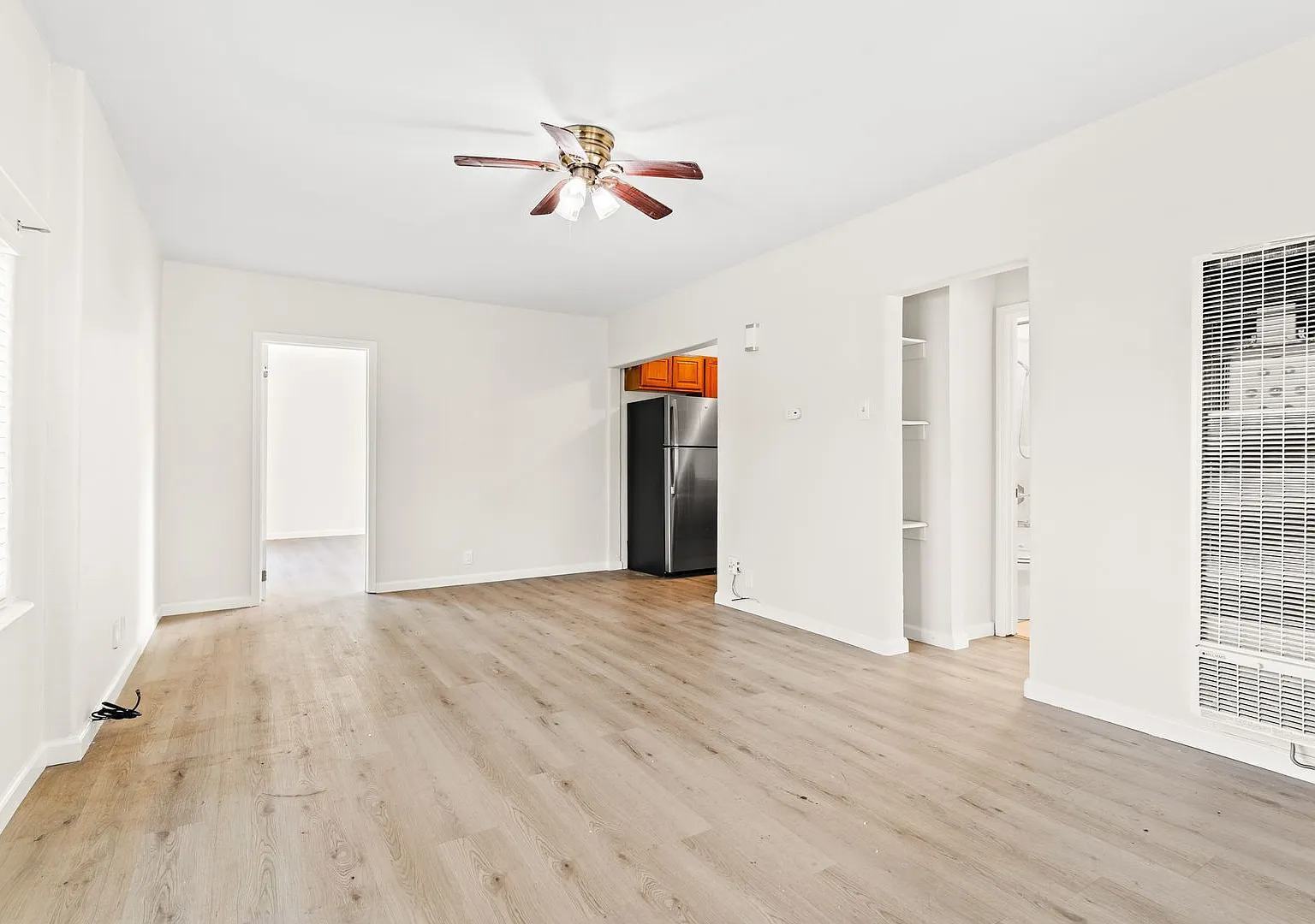 Bright & Updated 2-Bed, 1-Bath Corner-Lot Home | Gated Yard and Driveway — Photo 4