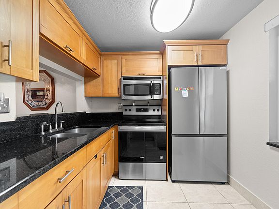 3rd image of 9400 Lime Bay Boulevard #109