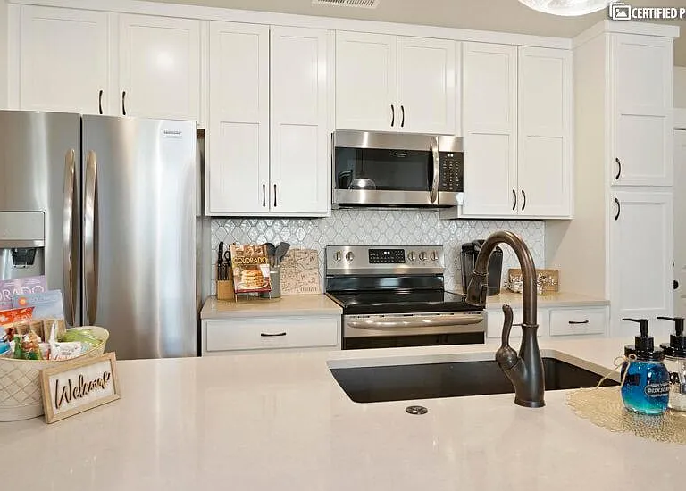 Kitchen is fully-equipped with quality name brand cookware