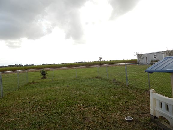 Backyard with fenced in area