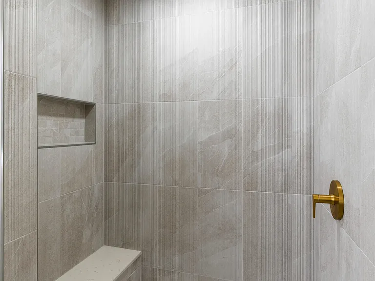 Premium homes feature extra indulgences as well, including hand shower systems in five-piece bathrooms