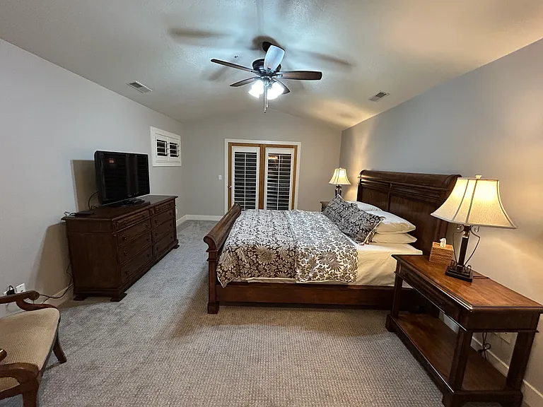 Master-bedroom, cal-king bed. Walk-out deck. 2 walk-in closets, master bath/shower. Second foor of the condo.