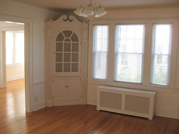 A built-in china cabinet adorns the dining room.
