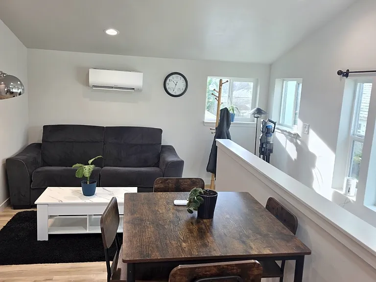 Living/dining area
Comfy couch has electronic recliner adjustability