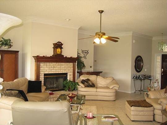 Grand Living Room w/ Brick Fireplace