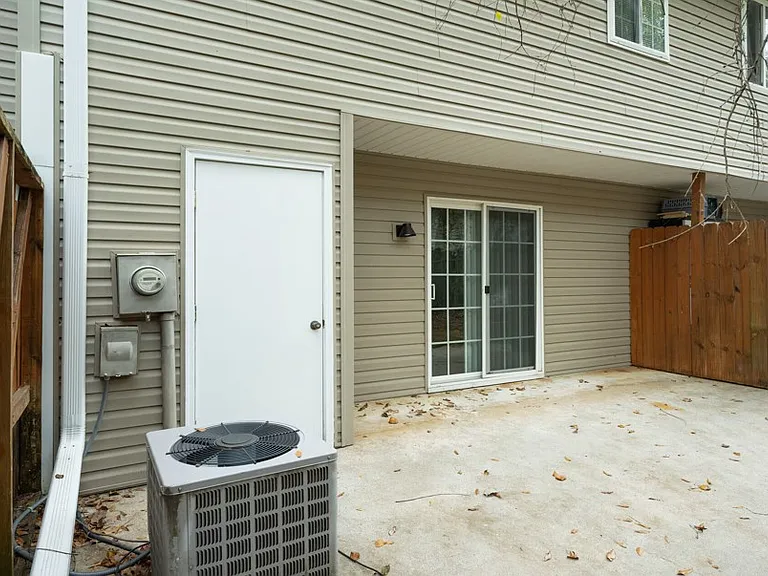 Exterior patio w/ privacy fence