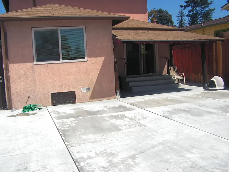 This is the downstairs patio door that leads into a nice cozy back yard. You can enter the backyard from the kitchen.