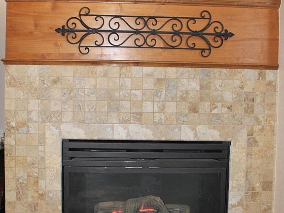 Beautiful gas fireplace adds warmth to the main level