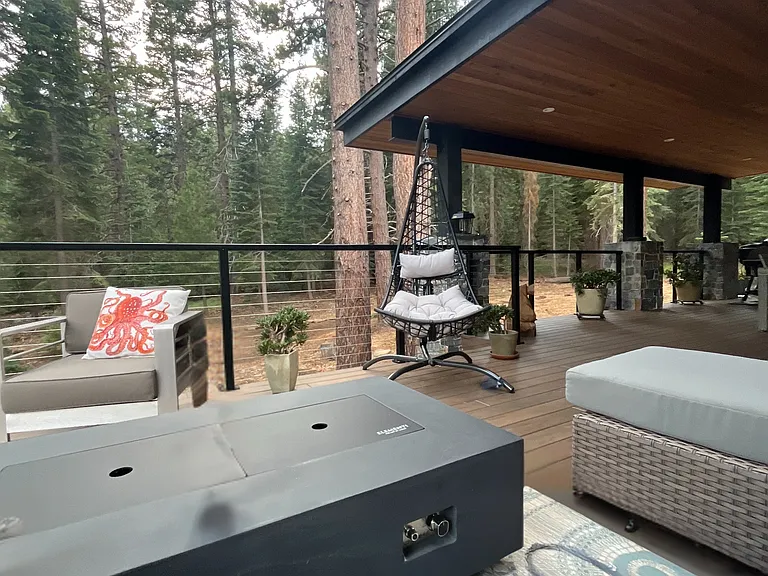 Huge outdoor deck with gas fire pit and living area keeps the Apres lively.