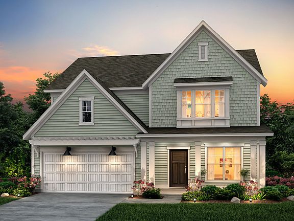 Mercer Exterior 18 with Shake siding accent, full front porch and two car garage.