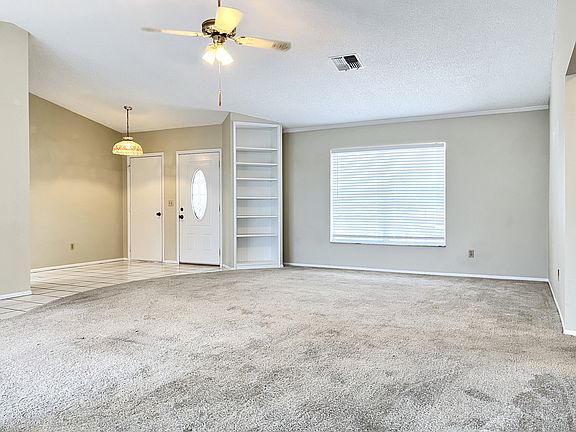 LIVING ROOM - FRONT ENTRY/GARAGE ENTRY