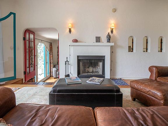 Living room and steps down to master bedroom / master bathroom / library / laundry / 2nd bedroom
