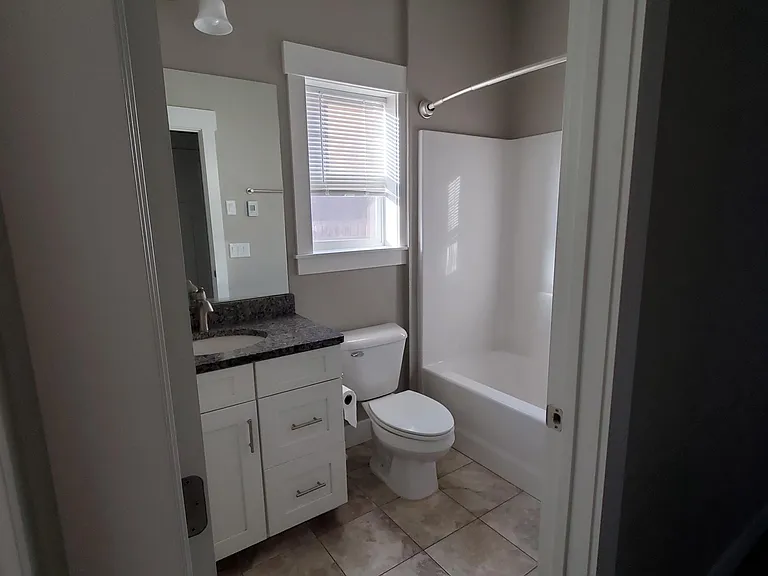 Main floor bath also with radiant heat under tile flooring.
