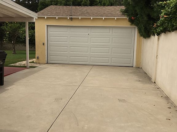 Backyard driveway and garage