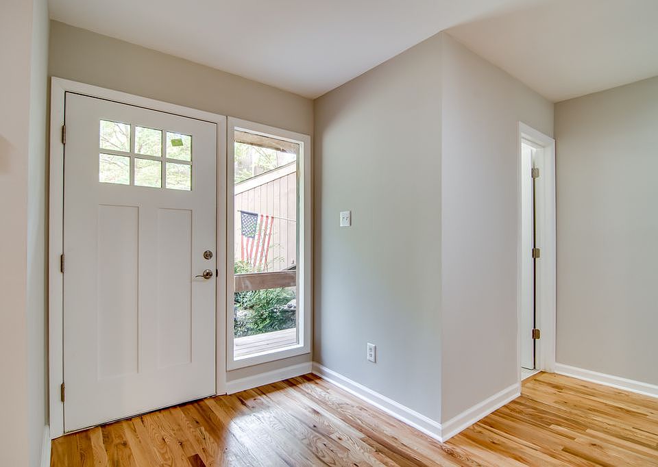 Bright and welcoming foyer entrance.