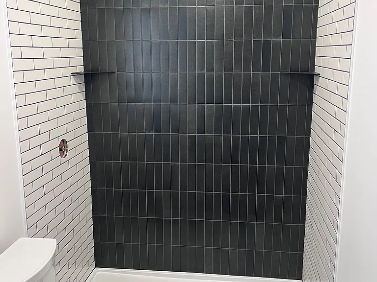 Designer finishes: modern floating bathroom vanities, custom tile shower surrounds and flooring, and high end finishes are featured in each spacious bathroom.