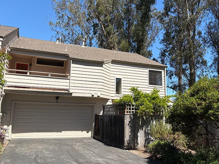 Drive way side with 2 car garage