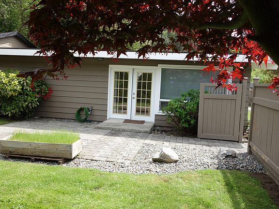 French door entry from the fence/gated yard