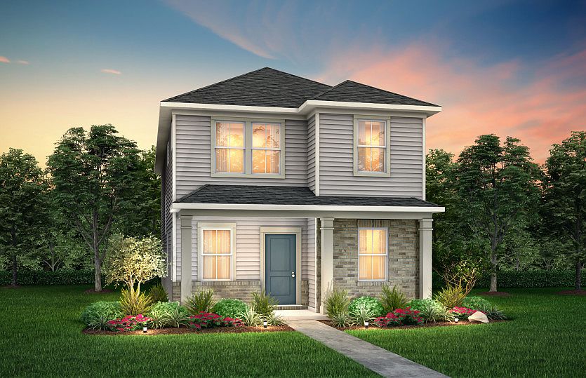 Wylie Exterior 8 features siding, brick, covered front sitting porch and 2 car rear load garage