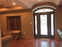 Hallway
						:
						Beautiful custom hand forged banister by local artist