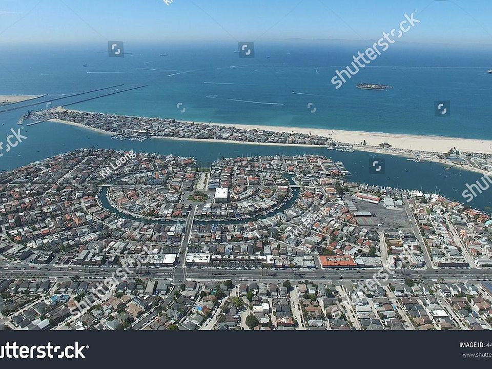 Aerial shot of the peninsula. Beautiful open beach area.