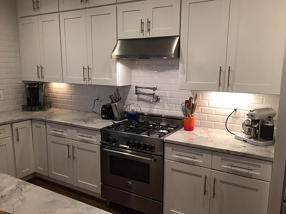 Gas stove & range with pot-filler faucet