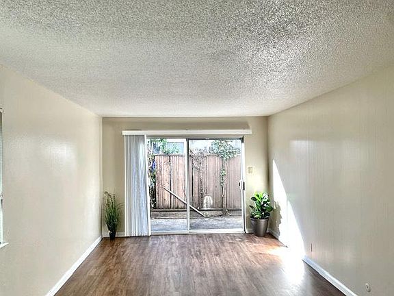 Living room looking out to private patio