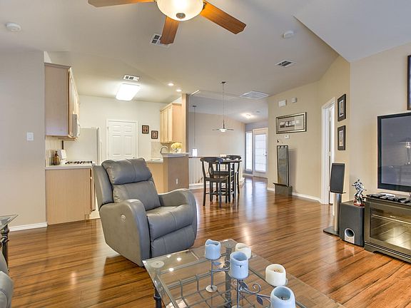 Open, bright living space with bamboo floors