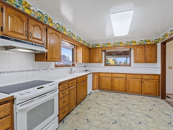 4th image of 5511 N Drumheller St