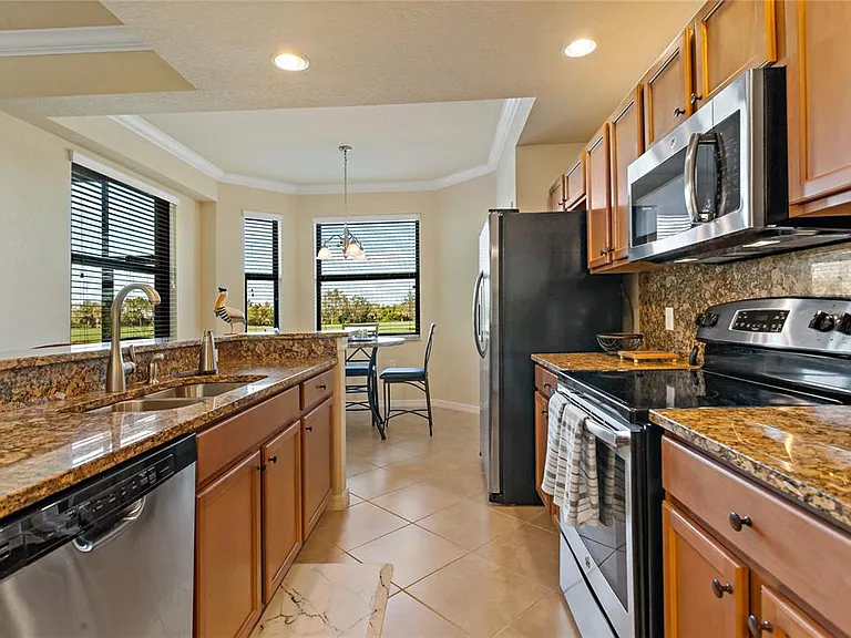 7121 River Hammock Dr #102 — Photo 16