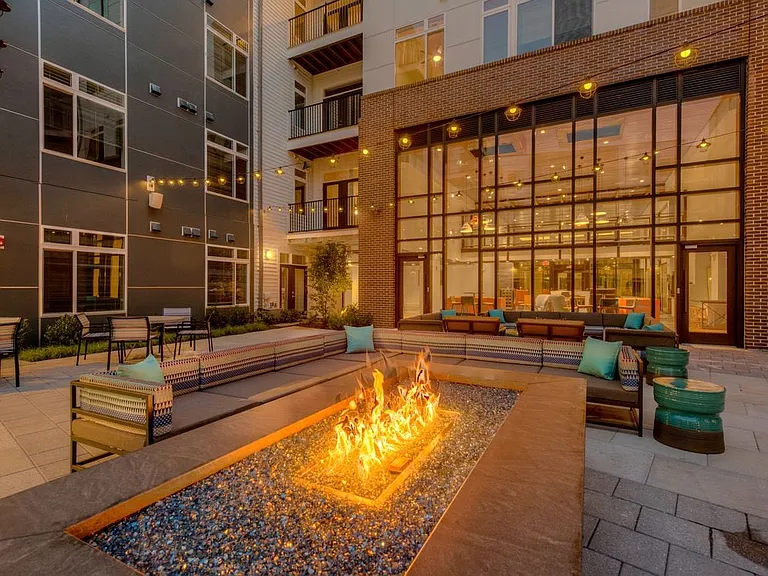 Outdoor chill lounge with fireplace and lounge seating