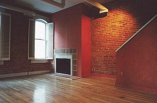 1st floor facing NW.  Working fireplace.