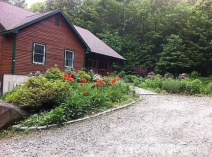 Back of house
						:
						Deck runs from left side almost to other end of house!