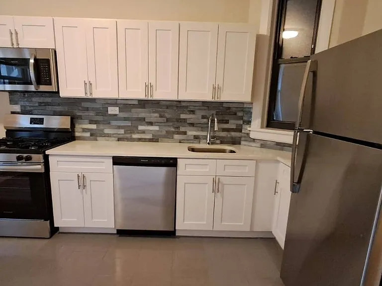 Remodeled kitchen with new stainless appliances