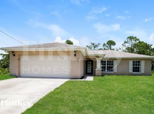 915 Kanuga St E, Lehigh Acres, FL 33974