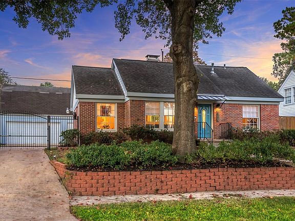 Elevated front yard makes a striking first impression. Home is not in any high risk flood zone, and no previous flooding (per Seller). Oversized 2 car garage with Studio above built approx 2001. All exterior trim, fascia boards, soffits, and gables r