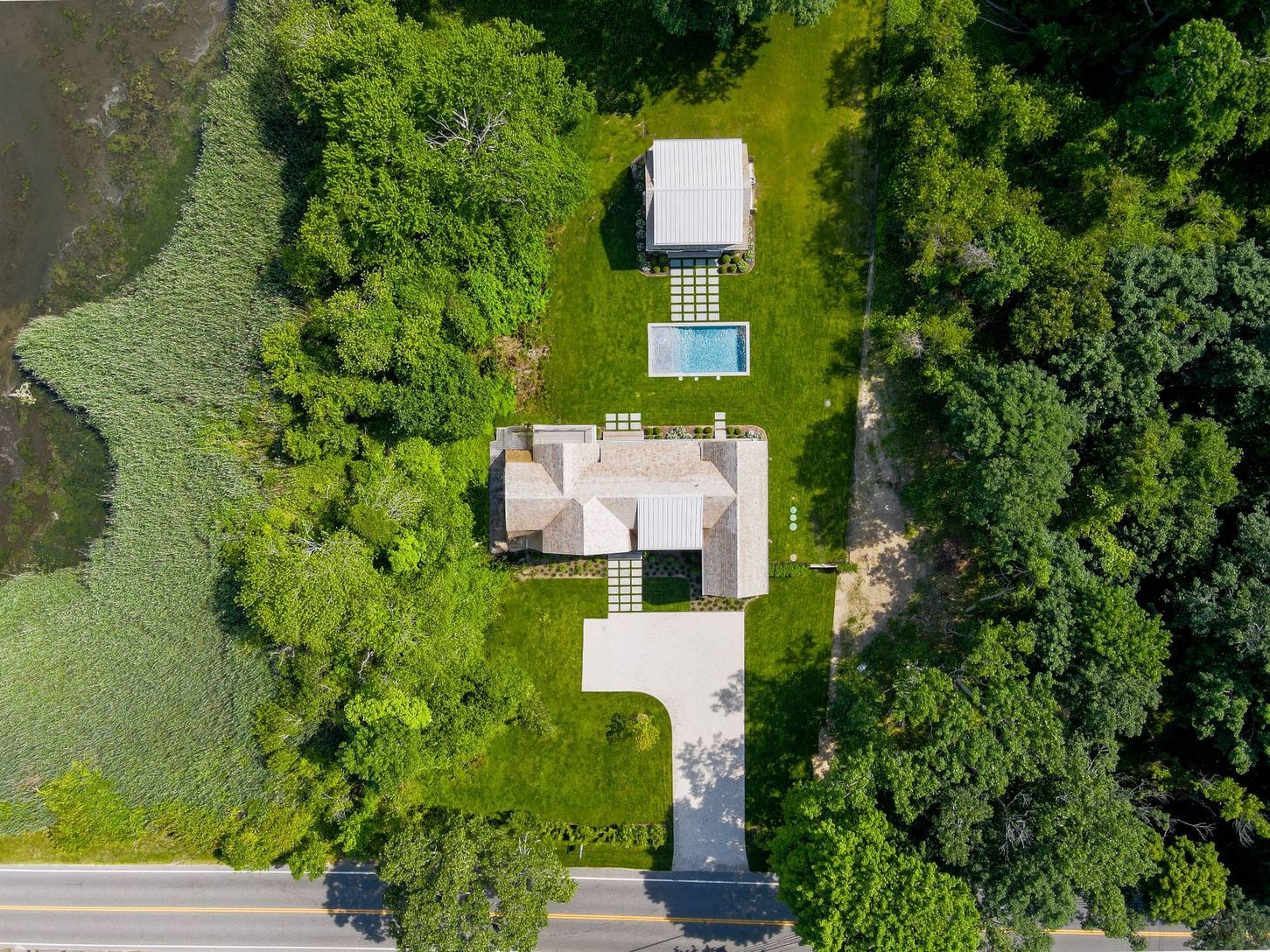  Birdseye view of extremely  private  1.5 acres Hamptons Compound featuring  2 Structures!
