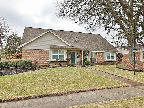 Mature landscaping and beautiful trees enhance this home which has been completely painted on the exterior. All windows have been recently replaced as well as the Air Conditioner!