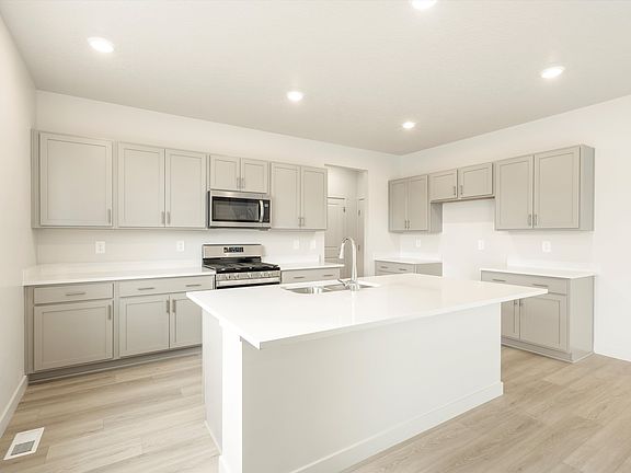 The Logan floorplan interior image taken at a Meritage Homes Community in Grantsville, UT.