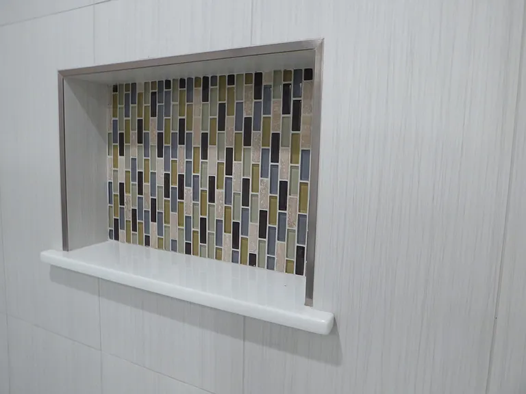 Attention to details is reflected in the many useful and stylish built-ins.