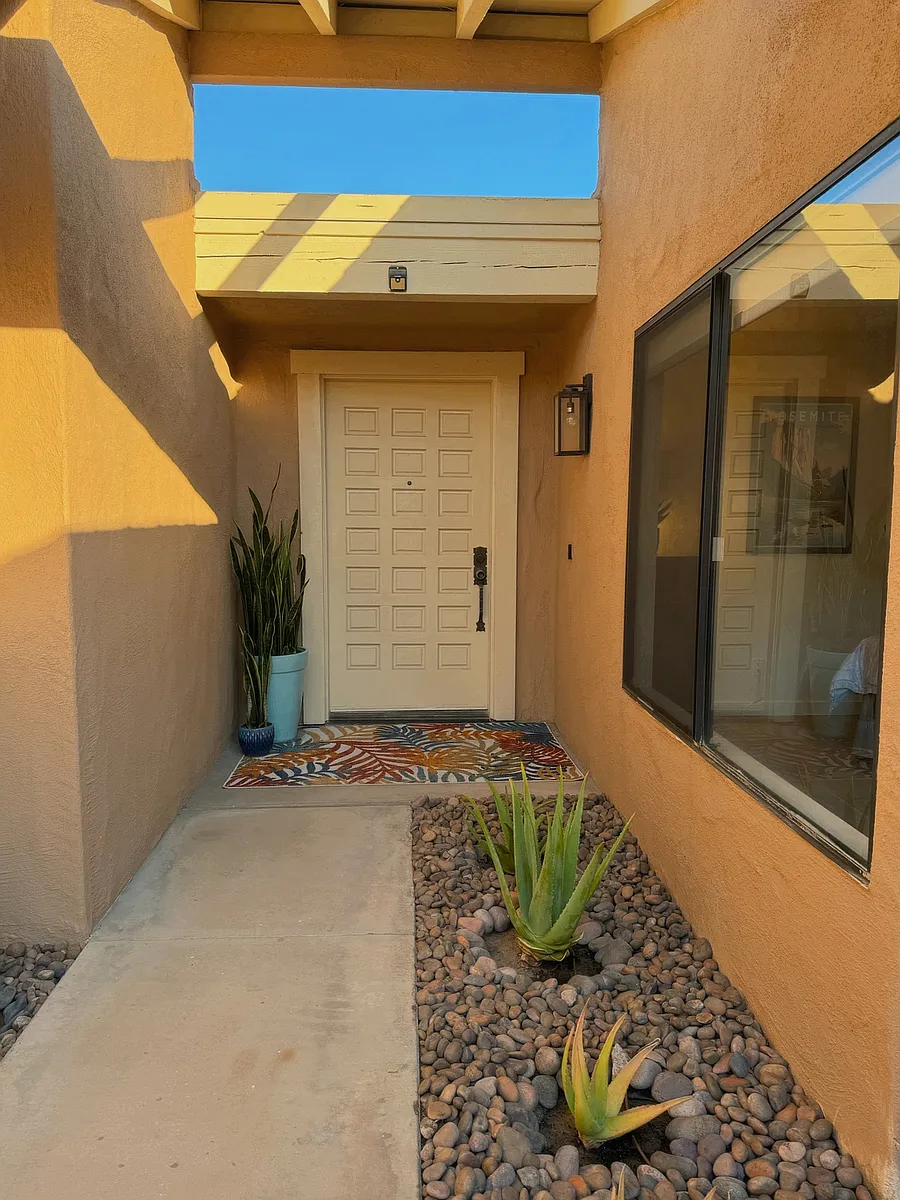 Private, gated front entry - W Castellana