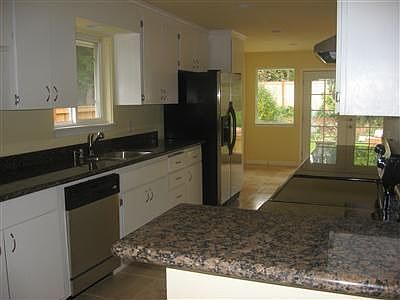 Slab granite and loads of natural light