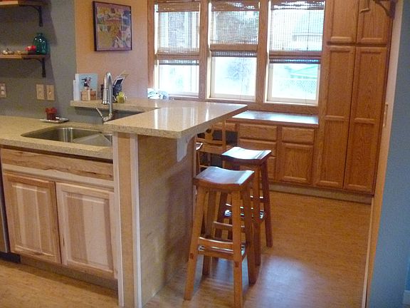kitchen, bar, desk behind
