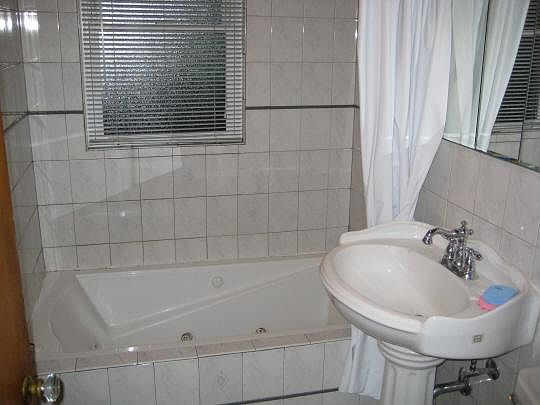 Bathroom has Jacuzzi tub 