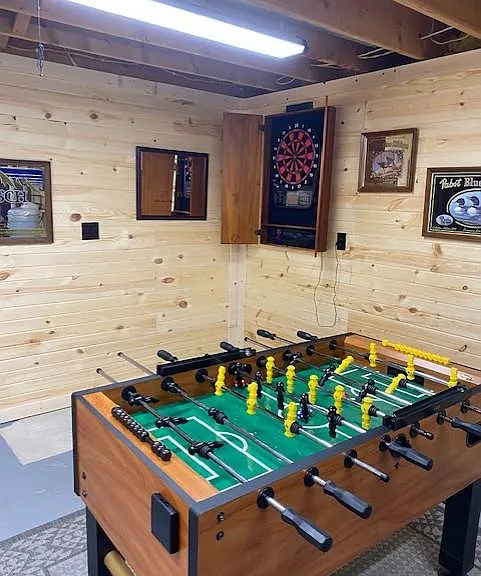 Lower Level Bar area with foos ball table and darts