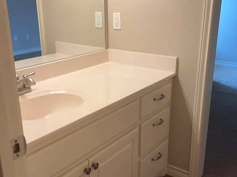 Jack and Jill bathrooms between two upstairs bedrooms