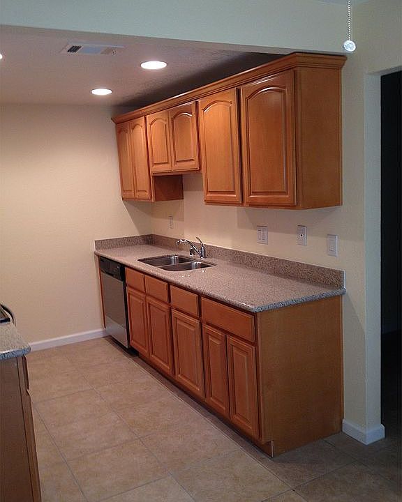 Granite Counter-tops, Premium Cabinets, Stainless Steel Appl