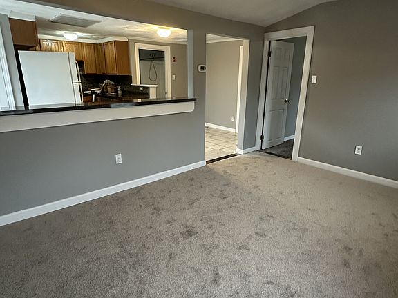 Living room looking into kitchen