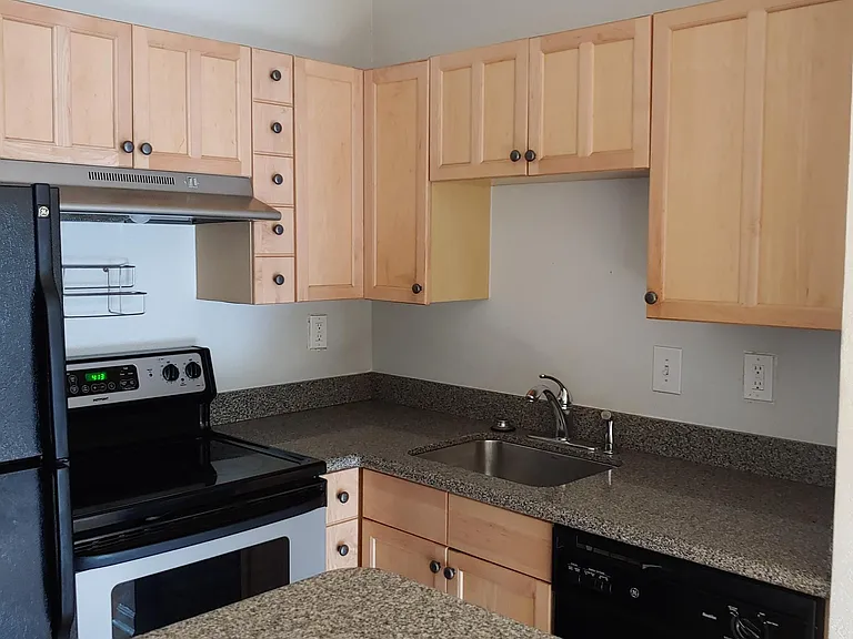 Kitchen view. Granite counters, dishwasher!!